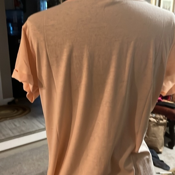 Front pocket, teeshirt scoop, neck, rolled shoulders, polyester, and cotton - Picture 4 of 5